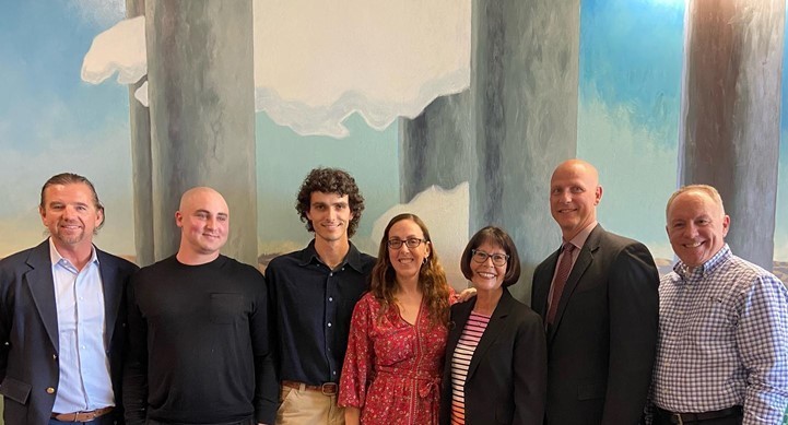 Standing in front of the mural from left to right Chris Housel, Chase Bidner, Nate Mulroy, Leora McCloskey, Dr. MaryAnn Rannels, Dr. Derek Bub, Rick Kennedy