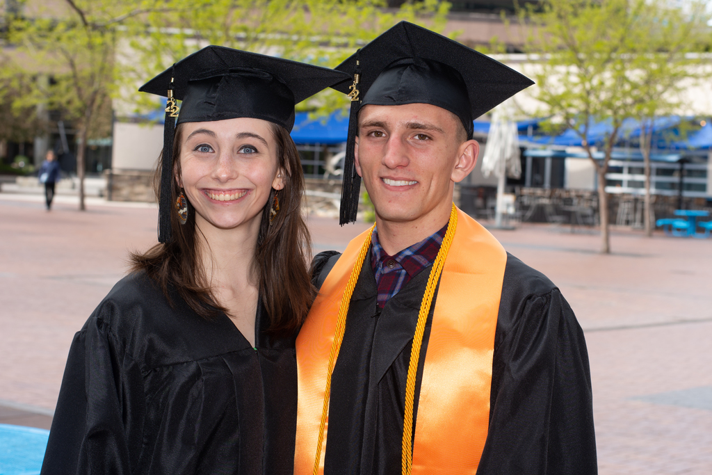 two renaissance students at isu graduation