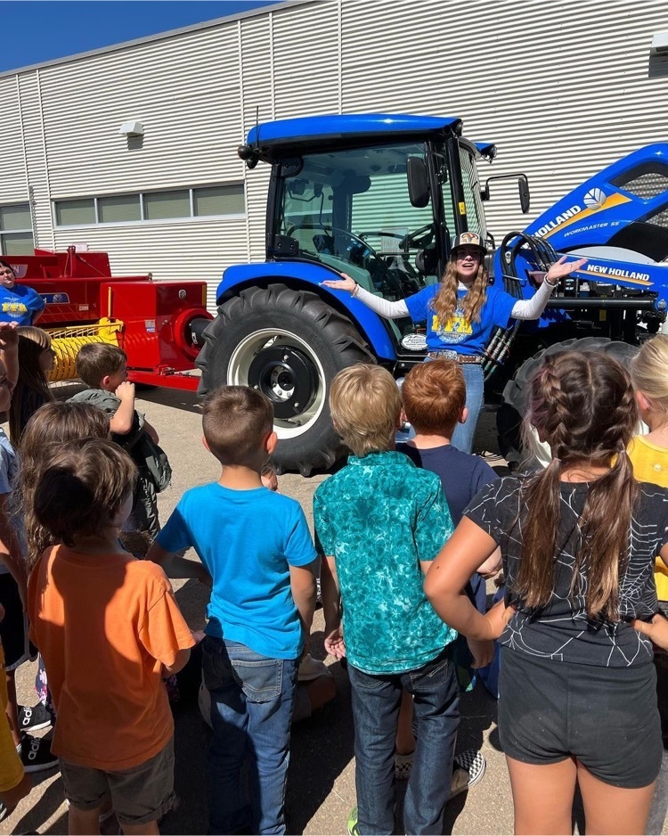 student learn about a tractor